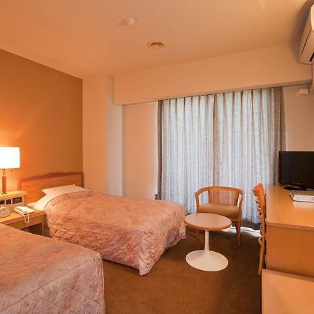 Hotel Tenchikaku Хитати Экстерьер фото